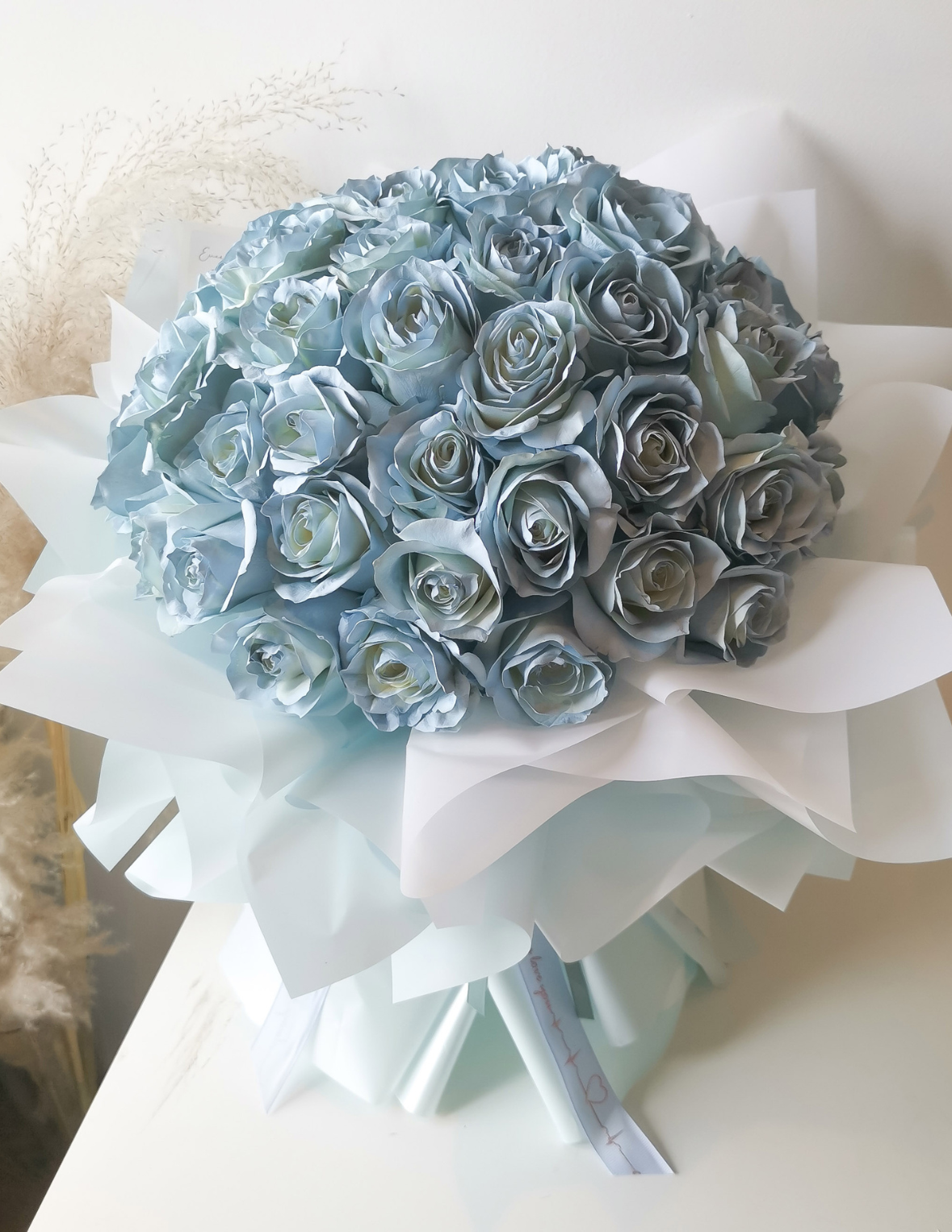 pastel blue rose bouquet